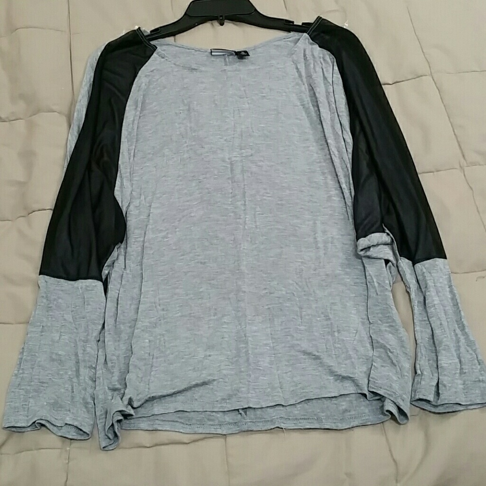 Grey top with black mesh sleeves